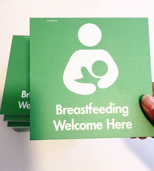 Green 'Breastfeeding Welcome Here' sign