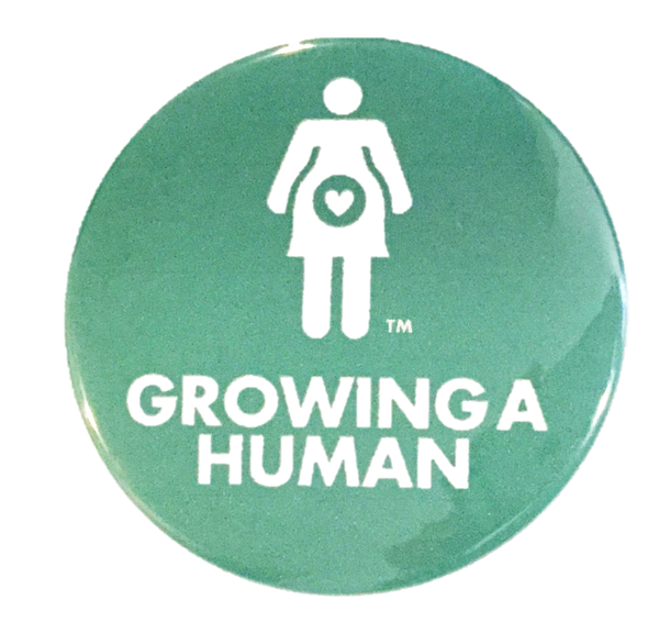 Growing a Human Graphic Pin - English